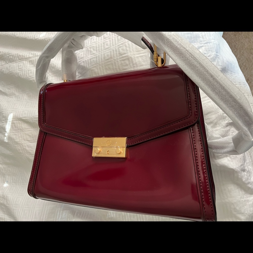 Brand New Tory Burch bag with handle and long strap.